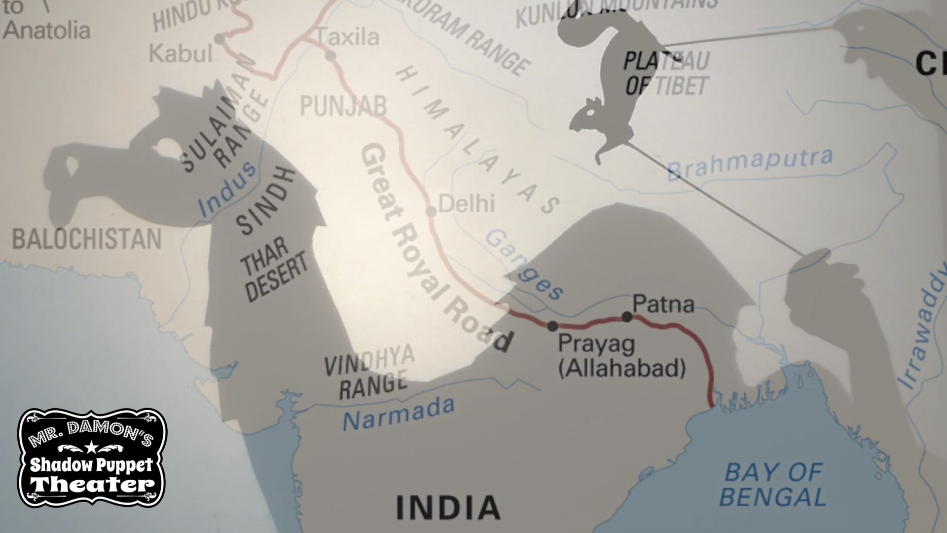Camel and squirrel shadow puppets travelling across a map of the Silk Road